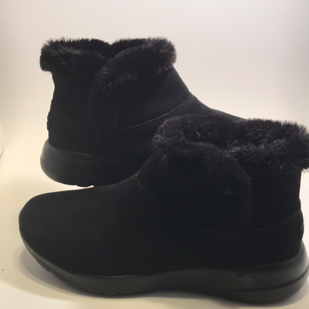 Sketchers walking boots.